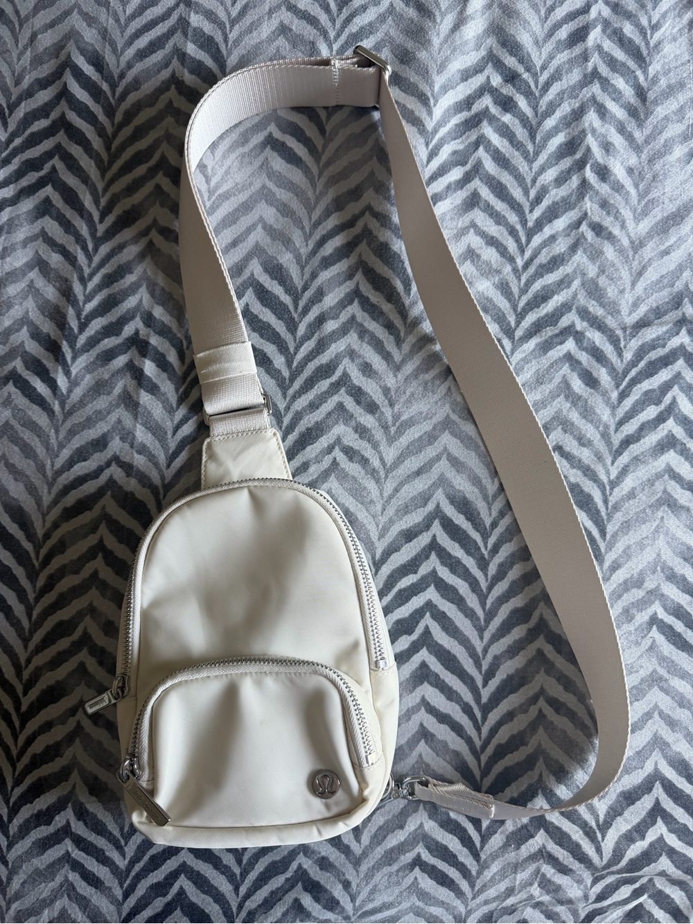 Cream Lululemon sling bag 2L